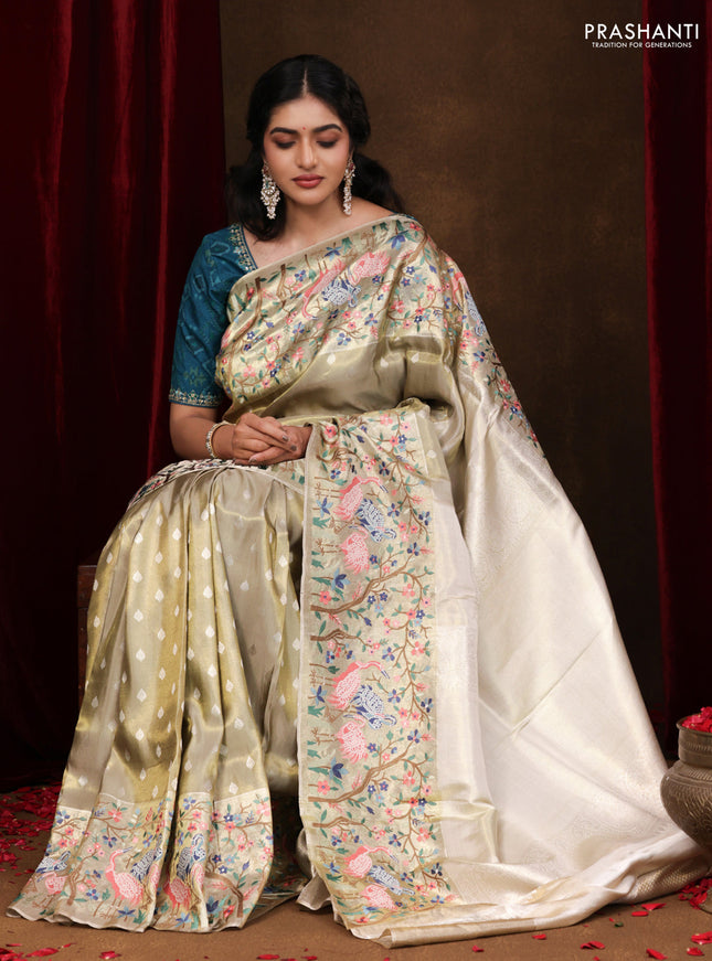 Elaichi Green Pure Kanchipuram Silk Saree With Silver Zari Buttas & Border Embroidery