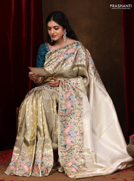 Elaichi Green Pure Kanchipuram Silk Saree With Silver Zari Buttas & Border Embroidery
