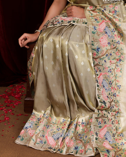 Elaichi Green Pure Kanchipuram Silk Saree With Silver Zari Buttas & Border Embroidery