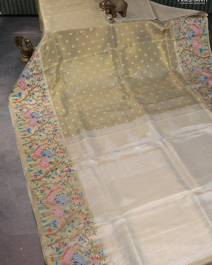 Elaichi Green Pure Kanchipuram Silk Saree With Silver Zari Buttas & Border Embroidery