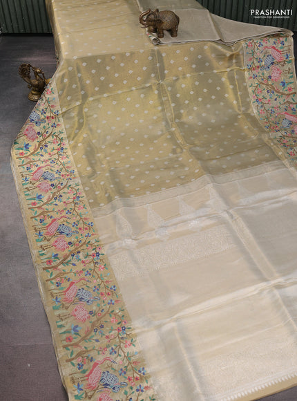 Elaichi Green Pure Kanchipuram Silk Saree With Silver Zari Buttas & Border Embroidery