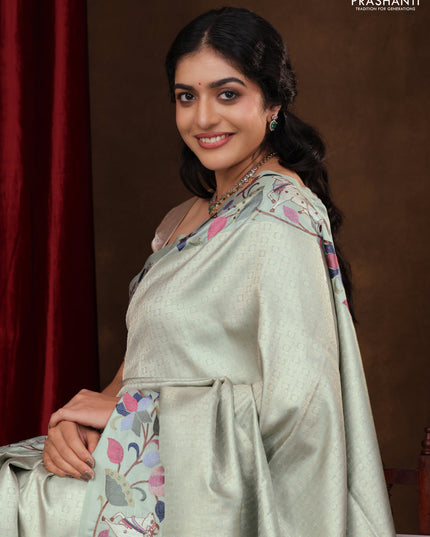 Pastel Green Pure Kanchipuram Silk Saree With Rudhraksha zari weaves & Pichwai Design Border Embroidery