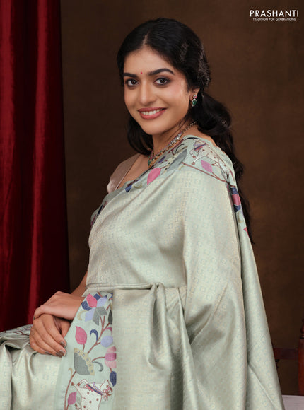 Pastel Green Pure Kanchipuram Silk Saree With Rudhraksha zari weaves & Pichwai Design Border Embroidery