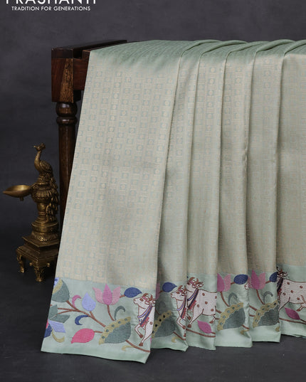 Pastel Green Pure Kanchipuram Silk Saree With Rudhraksha zari weaves & Pichwai Design Border Embroidery