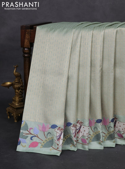 Pastel Green Pure Kanchipuram Silk Saree With Rudhraksha zari weaves & Pichwai Design Border Embroidery