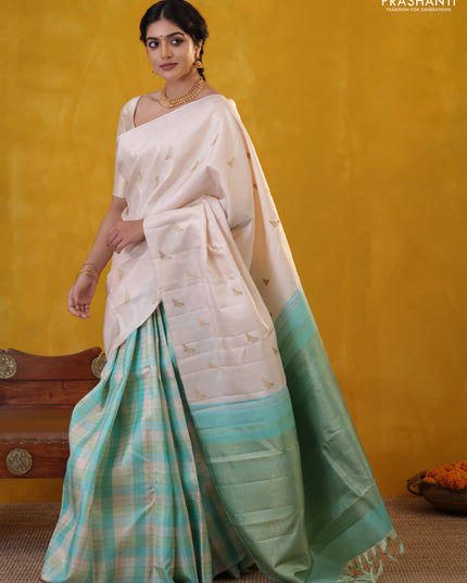 Off white-Teal blue Pure Kanchipuram silk saree With Zari woven peacock buttas