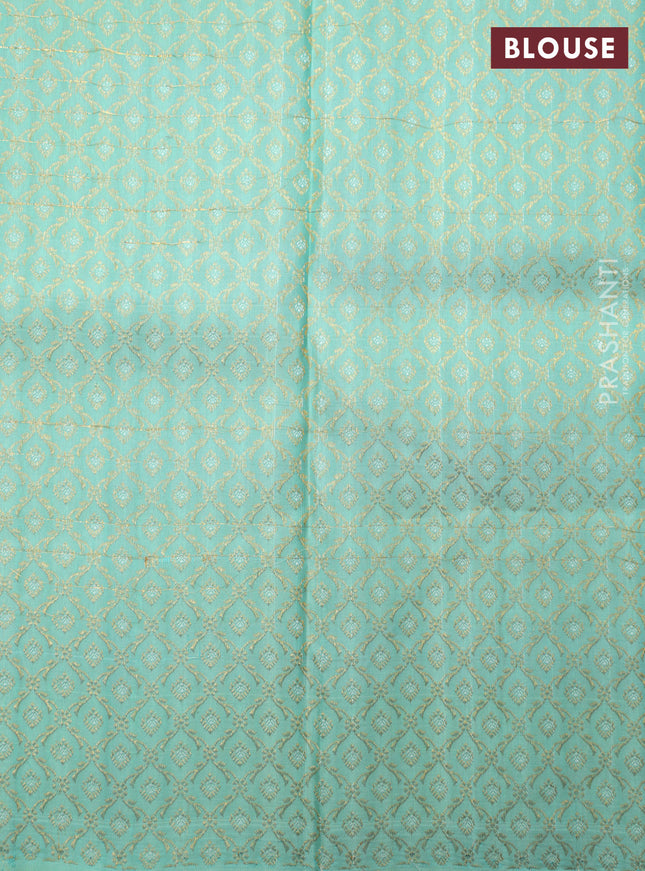 Off white-Teal blue Pure Kanchipuram silk saree With Zari woven peacock buttas