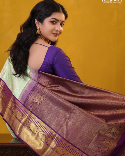 Pista Green-Violet Pure Kanchipuram Silk Saree With Allover Silver zari woven Brocade weaves