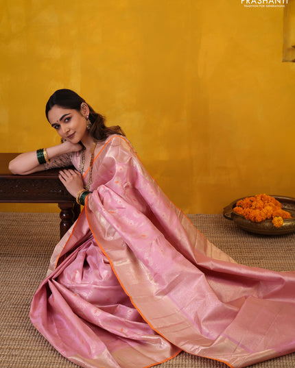 Pastel Pink-Orange Pure Kanchipuram Silk Saree With Allover Zari Weaves