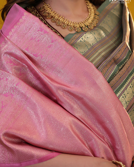 Pastel Green Pure Kanchipuram Silk Saree With Thread & Zari Stripes Pattern
