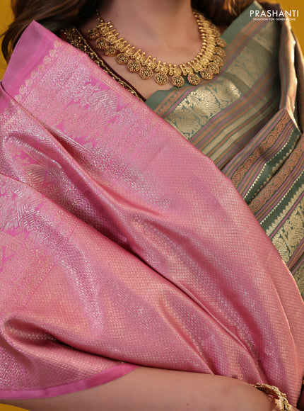 Pastel Green Pure Kanchipuram Silk Saree With Thread & Zari Stripes Pattern