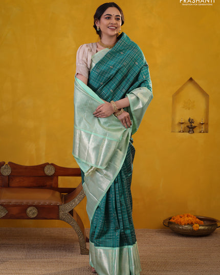Peacock green-teal shade pure kanchipuram silk saree with allover zari checked pattern