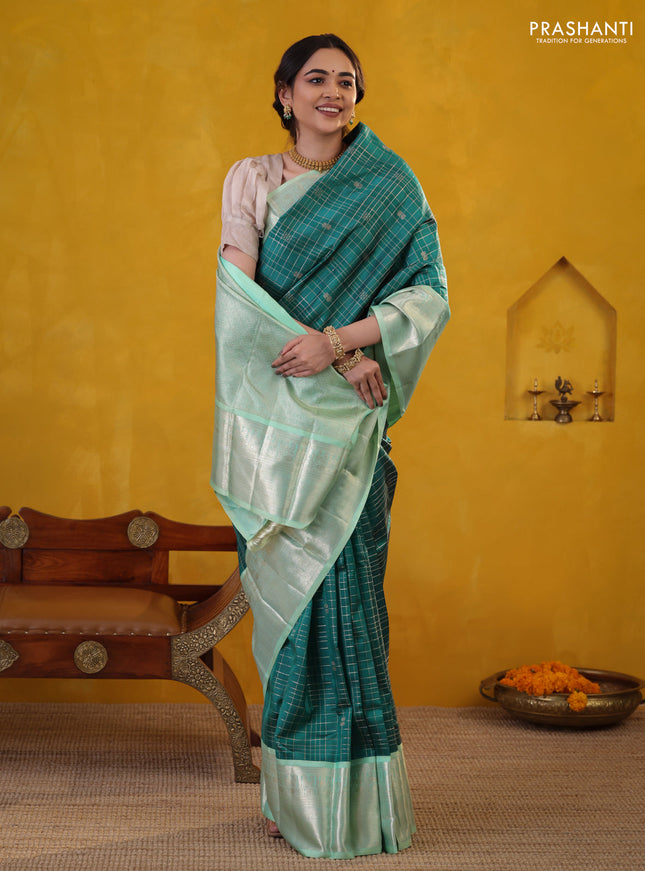 Peacock green-teal shade pure kanchipuram silk saree with allover zari checked pattern