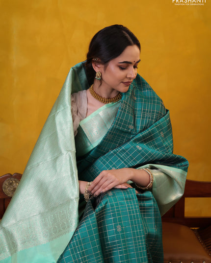 Peacock green-teal shade pure kanchipuram silk saree with allover zari checked pattern