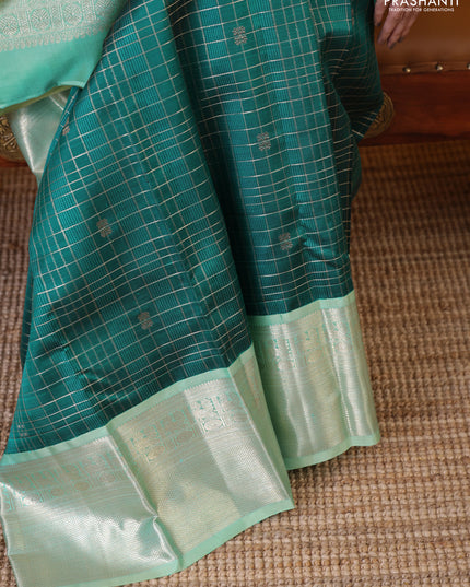 Peacock green-teal shade pure kanchipuram silk saree with allover zari checked pattern