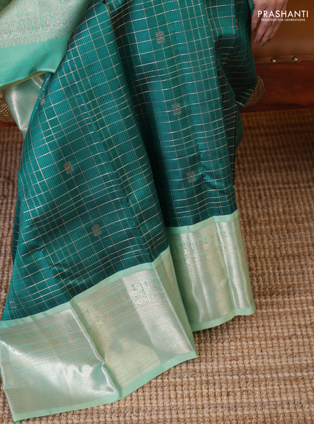 Peacock green-teal shade pure kanchipuram silk saree with allover zari checked pattern