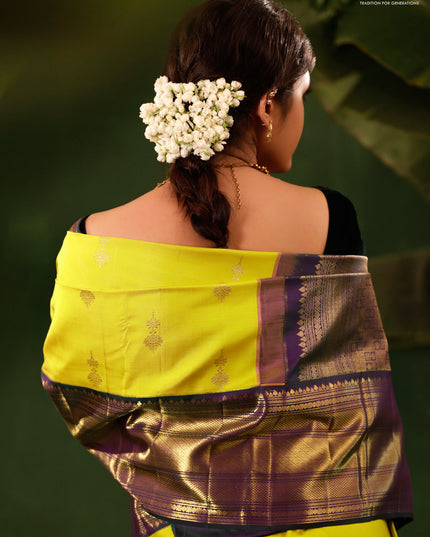 Yellow-Peacock green Pure kanchipuram silk saree With zari woven buttas