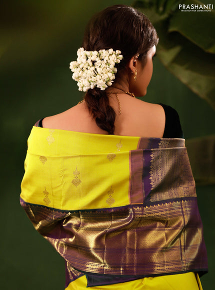 Yellow-Peacock green Pure kanchipuram silk saree With zari woven buttas