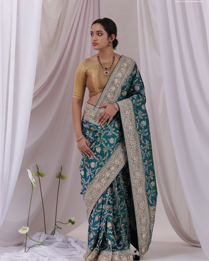 Teal Blue Banarasi Uppada silk saree with allover zari weaves & embroidery border