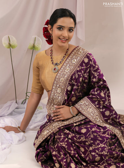 Purple Banarasi Uppada silk saree with allover zari weaves & embroidery border