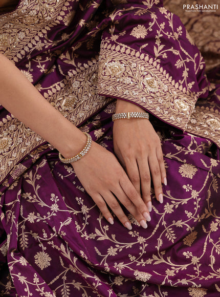 Purple Banarasi Uppada silk saree with allover zari weaves & embroidery border