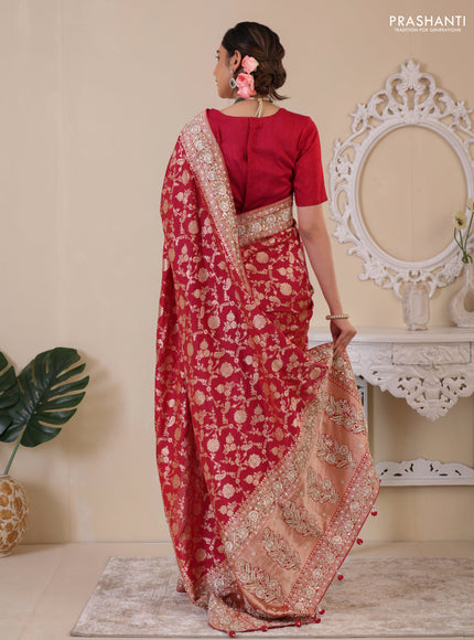 Pink Banarasi Uppada silk saree with allover zari weaves & embroidery border