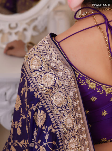 Violet Banarasi Uppada silk saree with allover zari weaves & embroidery border