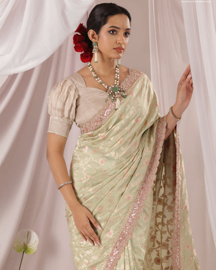Pastel Green-Peach Pink Banarasi Uppada silk saree with allover zari weaves & embroidery border