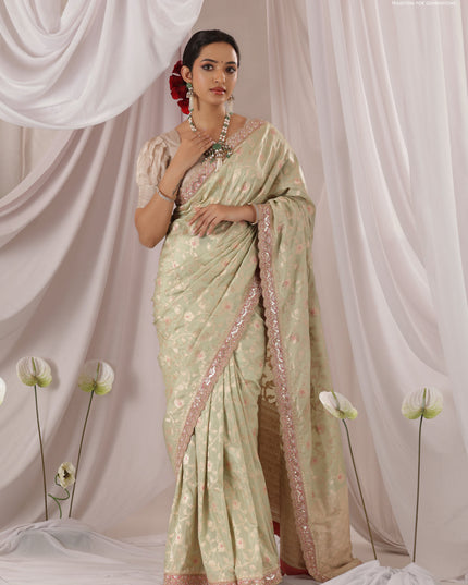 Pastel Green-Peach Pink Banarasi Uppada silk saree with allover zari weaves & embroidery border