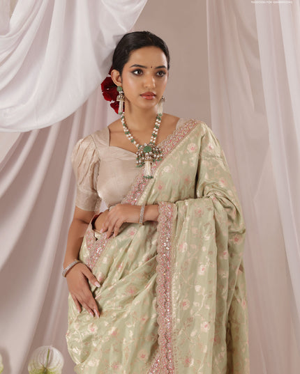 Pastel Green-Peach Pink Banarasi Uppada silk saree with allover zari weaves & embroidery border