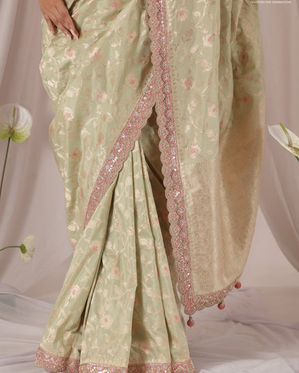 Pastel Green-Peach Pink Banarasi Uppada silk saree with allover zari weaves & embroidery border