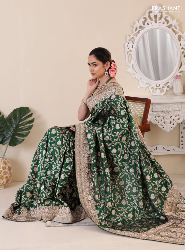 Green Banarasi Uppada silk saree with allover zari weaves & embroidery border