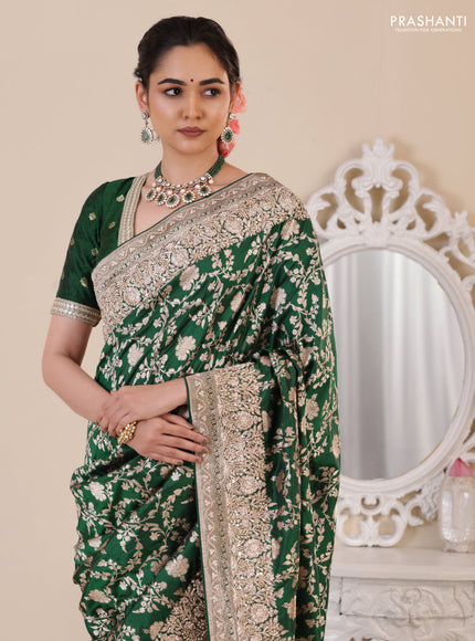 Green Banarasi Uppada silk saree with allover zari weaves & embroidery border