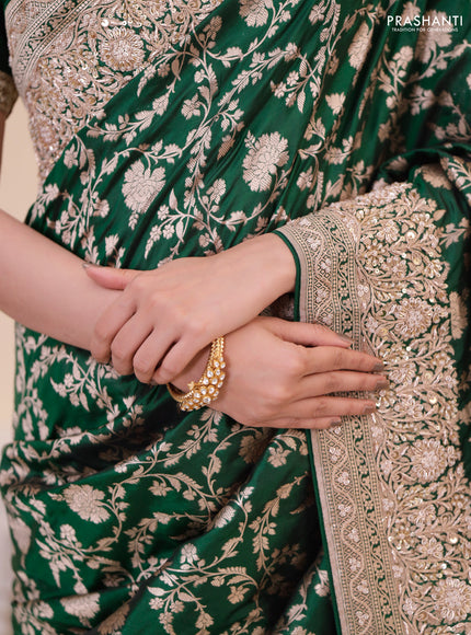 Green Banarasi Uppada silk saree with allover zari weaves & embroidery border