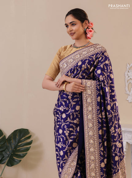 Blue Banarasi Uppada silk saree with allover zari weaves & embroidery border