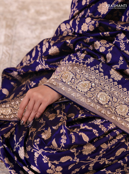 Blue Banarasi Uppada silk saree with allover zari weaves & embroidery border