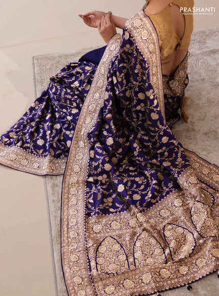 Blue Banarasi Uppada silk saree with allover zari weaves & embroidery border