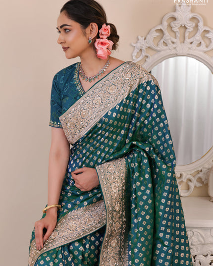 Teal Green Banarasi Uppada silk saree with allover zari woven buttas & embroidery border