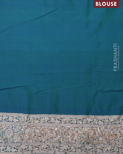 Teal Green Banarasi Uppada silk saree with allover zari woven buttas & embroidery border