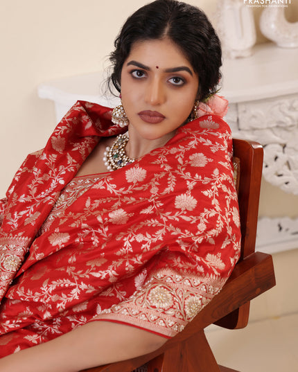 Red Banarasi Uppada silk saree with allover zari weaves & embroidery border