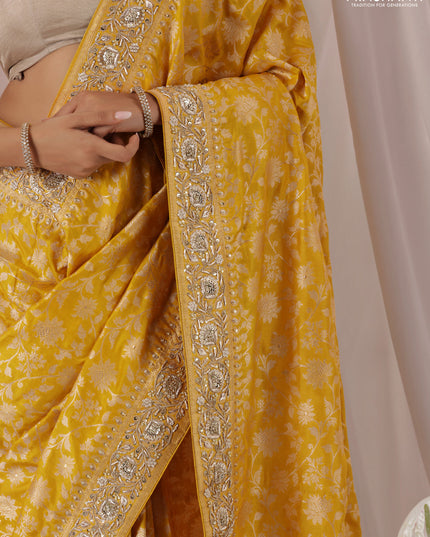 Mango yellow Banarasi Uppada silk saree with allover zari weaves & embroidery border