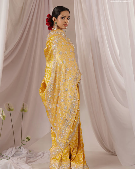 Mango yellow Banarasi Uppada silk saree with allover zari weaves & embroidery border