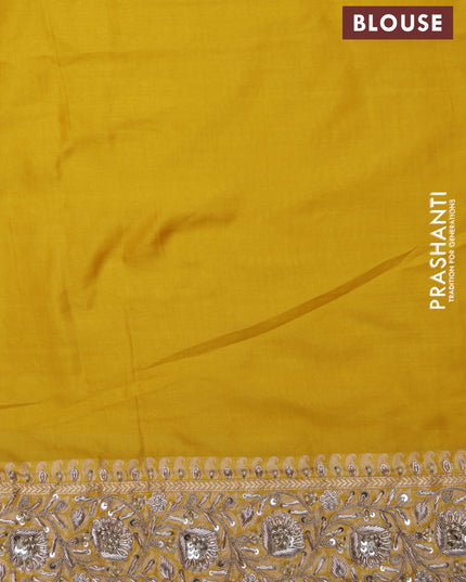 Mango yellow Banarasi Uppada silk saree with allover zari weaves & embroidery border