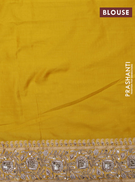 Mango yellow Banarasi Uppada silk saree with allover zari weaves & embroidery border