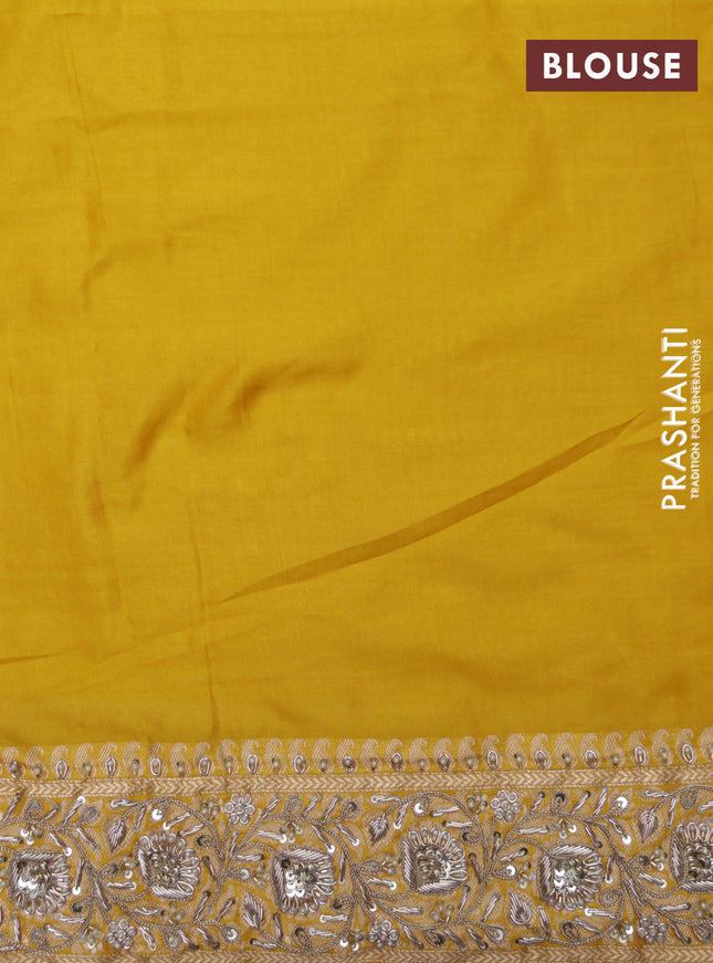 Mango yellow Banarasi Uppada silk saree with allover zari weaves & embroidery border