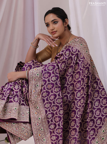 Purple Banarasi Uppada silk saree with allover zari weaves & embroidery border
