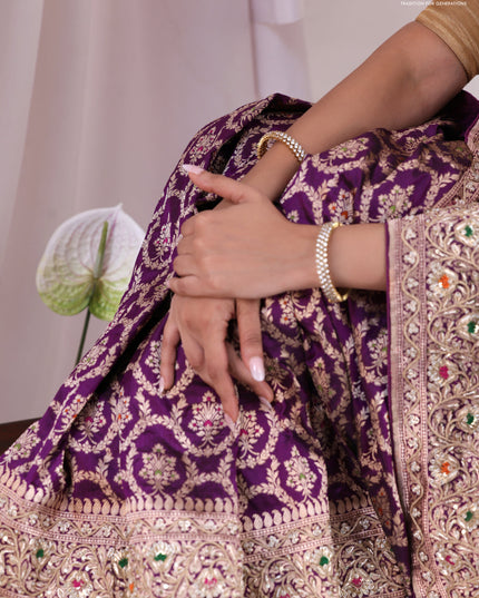 Purple Banarasi Uppada silk saree with allover zari weaves & embroidery border
