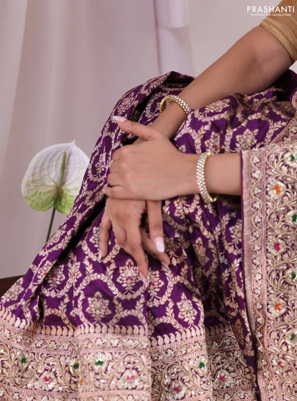 Purple Banarasi Uppada silk saree with allover zari weaves & embroidery border