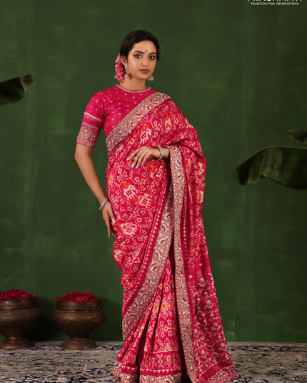 Pink Pochampally silk saree with allover ikat weaves and Embroidered border