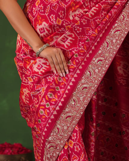 Pink Pochampally silk saree with allover ikat weaves and Embroidered border